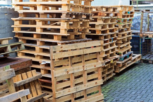 Man and van team preparing to collect office waste in Gipsy Hill