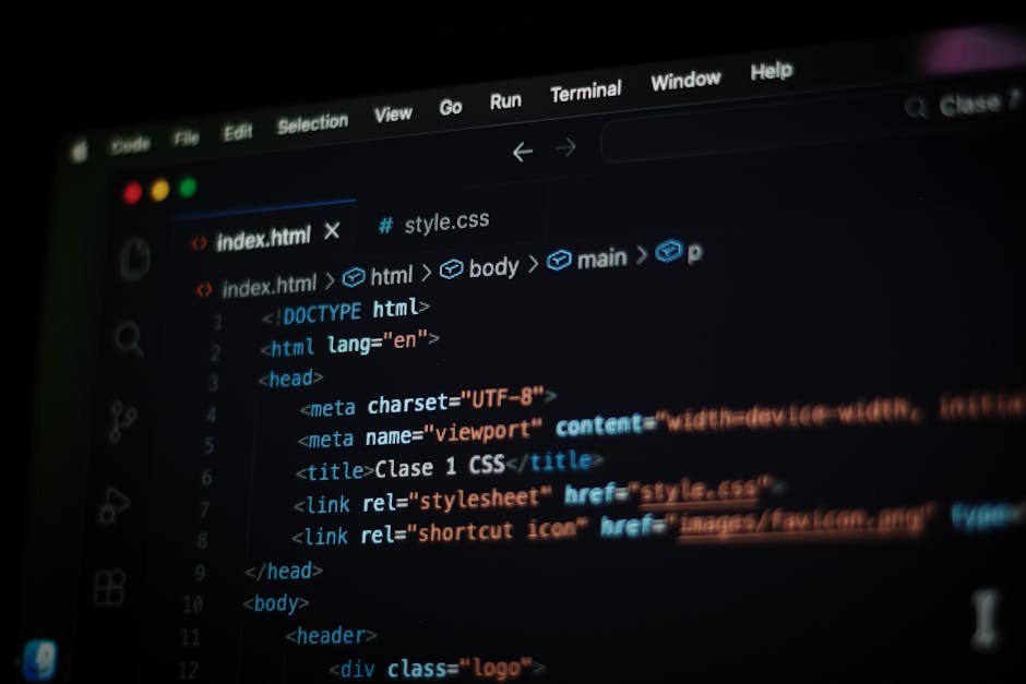 Close-up view of a computer monitor displaying a dense, colorful code script consisting of lines of programming language, with visible keywords, functions, and syntax highlighting in shades of blue, g